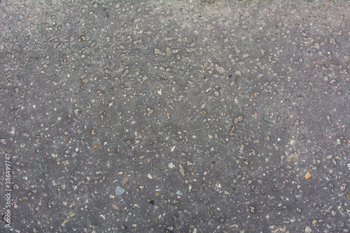 Texture of dry asphalt of gray color.