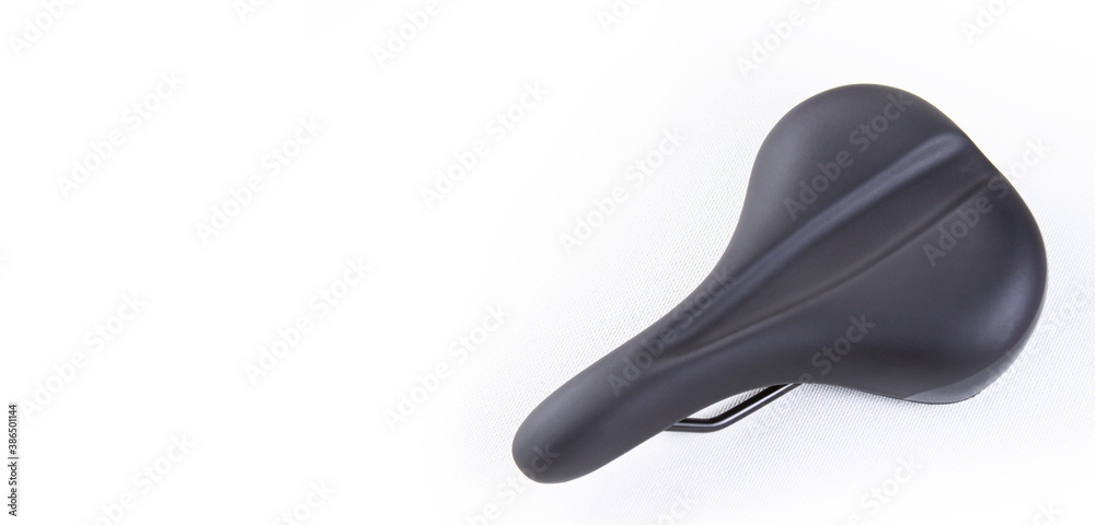 Bicycle saddle on white background, top view close up Bicycle saddle on white background, top view close up