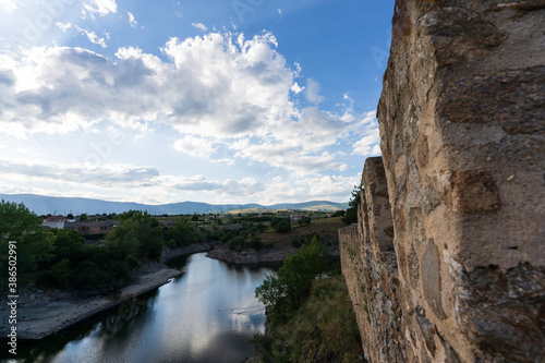 Rock wall, sky and river
