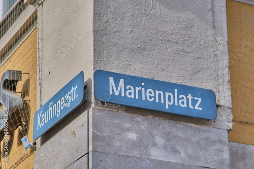 Street signs on the corner of square Marienplatz (Mary's Square) and street Kaufingerstrasse in Munich, Germany