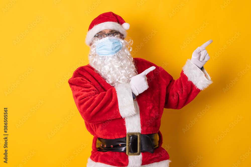 santa claus isolated on color background pointing to space santa claus isolated on color background pointing to space