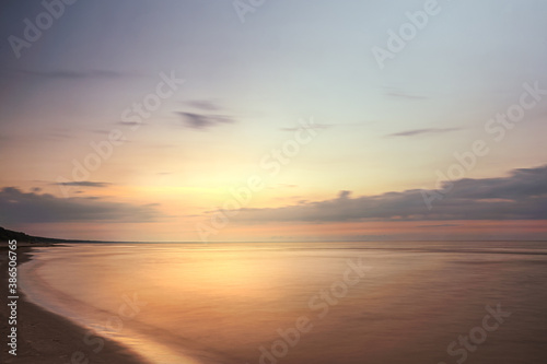 beautiful seascape at sunset, golden hour, long exposure