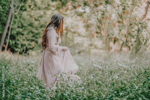 young lady dancing in the forest 