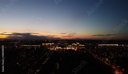 Top view of the night city at sunset