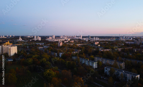 Top view of the outskirts of the city at sunset