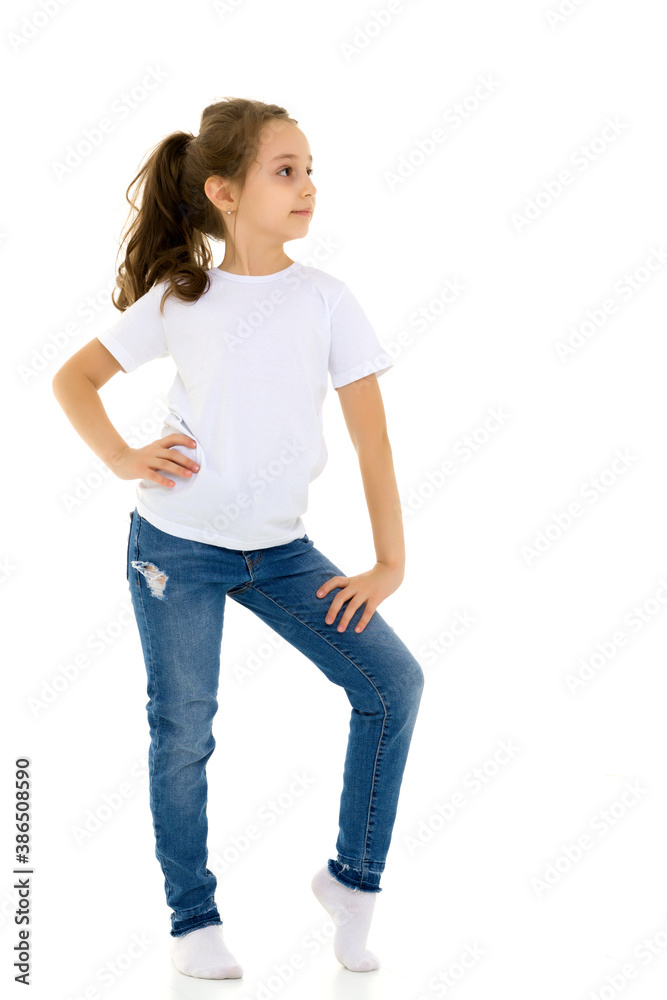 Pretty Stylish Girl with Ponytail Standing with Hands on Her Waist. Pretty Stylish Girl with Ponytail Standing with Hands on Her Waist.