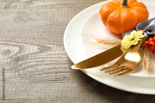Festive table setting on wooden background  closeup with space for text. Thanksgiving Day celebration