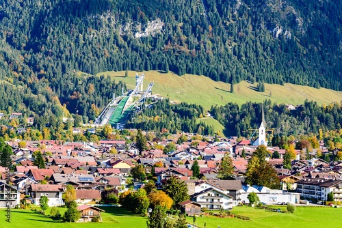 Panorama view on Obersdorf in Allgau, Bavaria, Bayern,  Germany. Alps Mountains in Tyrol, Austria. photo