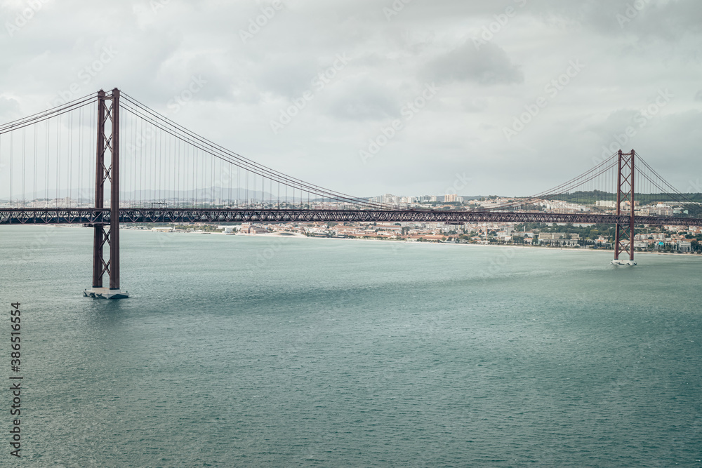 big bridge over the river in cloudy weather big bridge over the river in cloudy weather