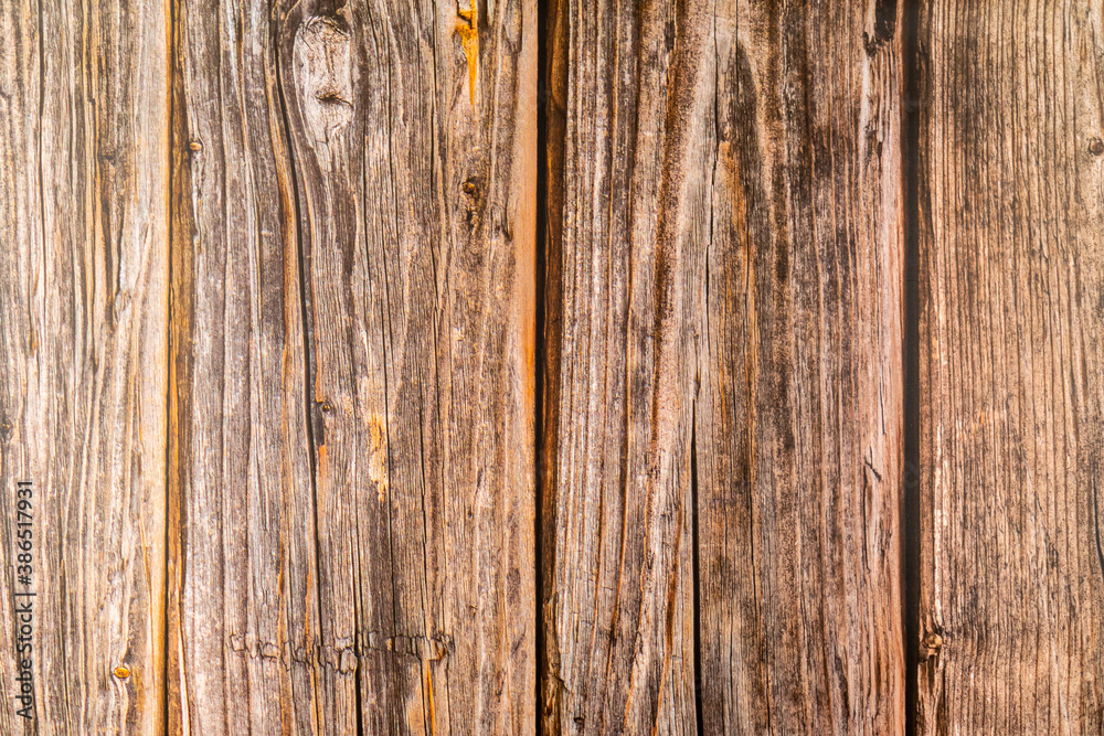Brown wooden texture background. Old wooden fence. Abstract natural backdrop. Brown wooden texture background. Old wooden fence. Abstract natural backdrop.
