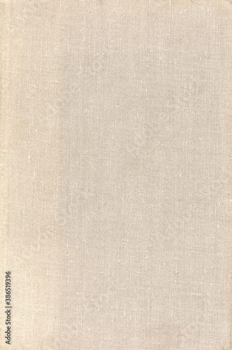 Textile texture. Old book cover. Rough canvas surface. Blank retro page. Empty place for text. Perfect for background and vintage style design.