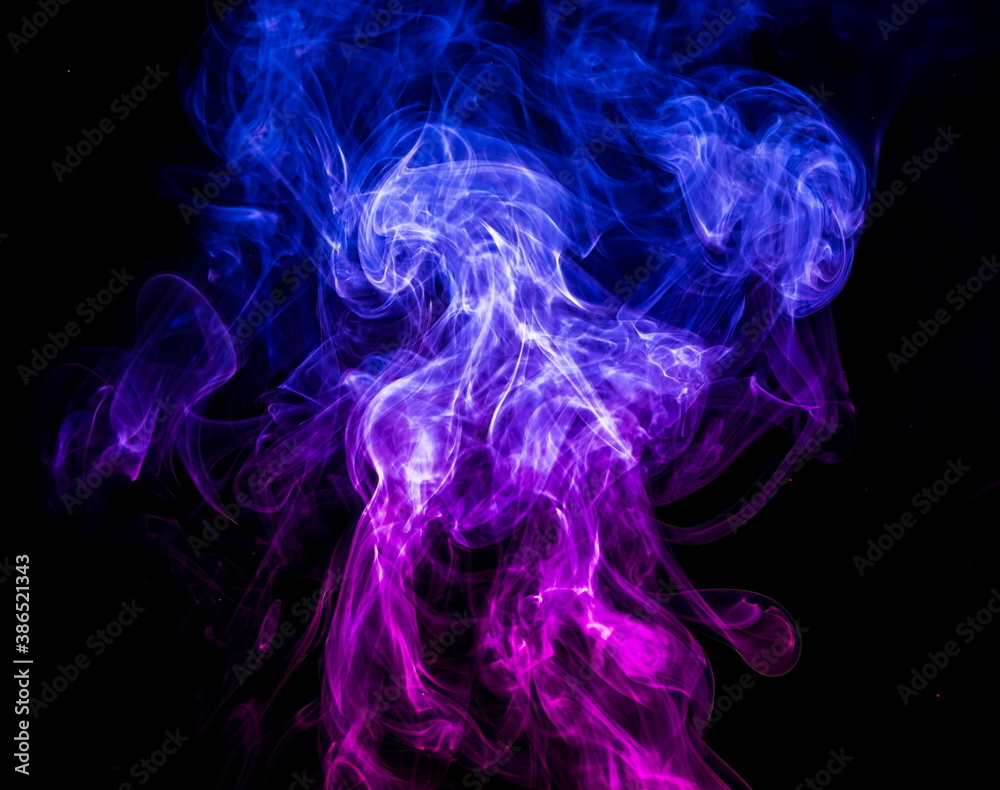 Obraz premium Colored smoke on black background