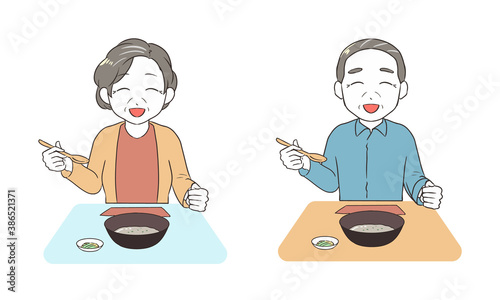 笑顔でお粥を食べる　シニア