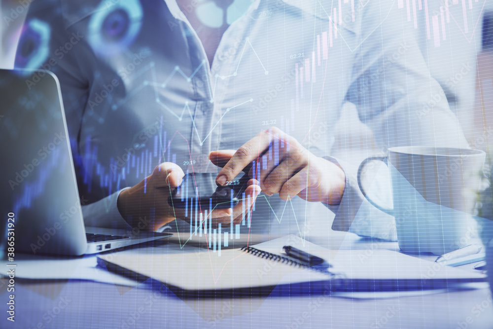Obraz premium Double exposure of forex chart sketch hologram and woman holding and using a mobile device. Financial market concept.