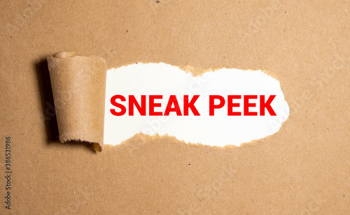 Bilde på lerret The phrase Sneak Peek appearing behind torn brown paper.