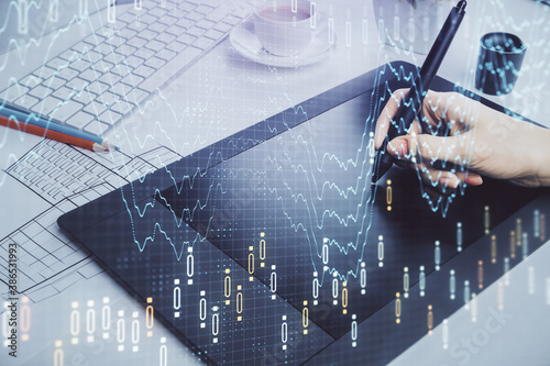 Double exposure of financial graph sketch hologram and woman holding and using a mobile device. Stock exchange concept.