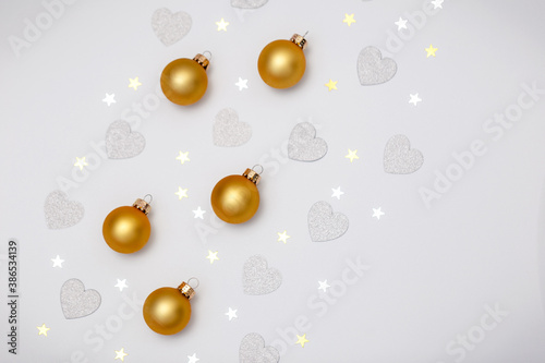 christmas balls, golden decorations on white background.