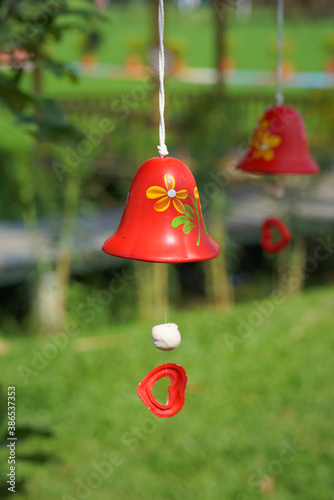 christmas bell hanging on the tree © sarawut