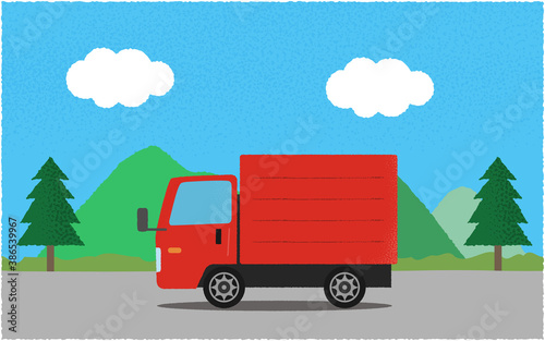 山沿いの道を進む赤いトラックのベクターイラスト
