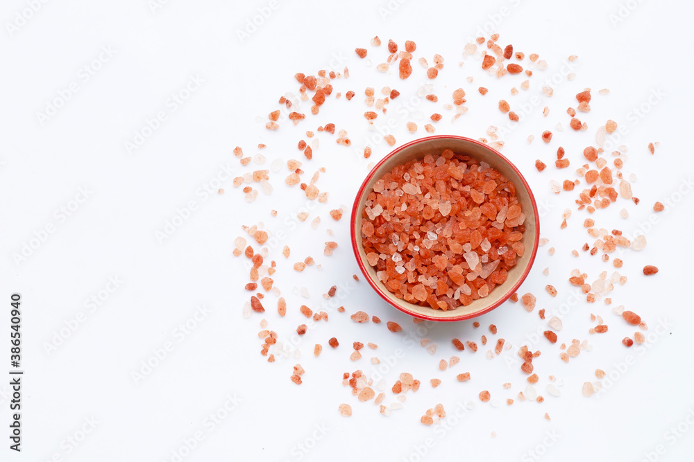 Pink himalayan salt in white background. Pink himalayan salt in white background.