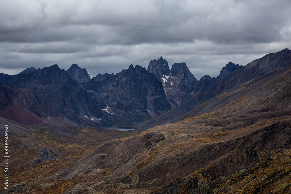 Beautiful View of Scenic Mountains, Lake and Landscape during the Fall Season in Canadian Nature. Taken in Tombstone Territorial Park, Yukon, Canada.