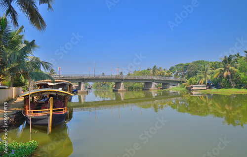Boats parked on the banks of kumarakom backwaters in Kerala. © saurav005