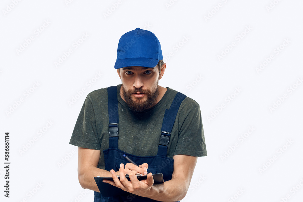 man in working uniform documents delivery loader transportation light background man in working uniform documents delivery loader transportation light background