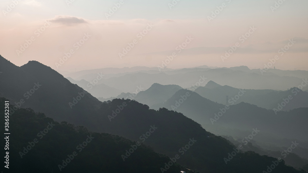A Landscape panorama view of ocean and mountain with the beautiful sky. T