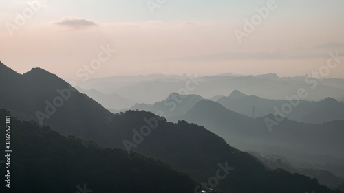 A Landscape panorama view of ocean and mountain with the beautiful sky. T