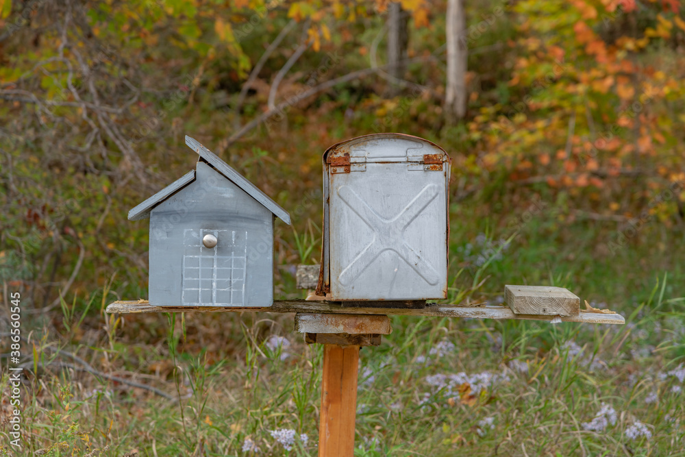 Pair of roadside rural mailboxes one unique landscape