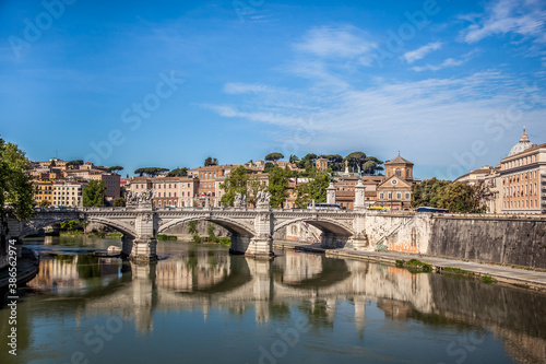 The banks of the river Tiber and Ponte Vittorio Emanuele in Rome. Lazio, Italy