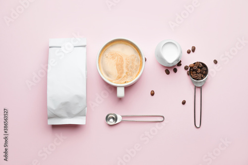 Composition with hot coffee on color background