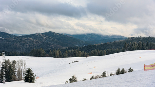 Fototapeta Naklejka Na Ścianę i Meble -  Panoramic winter view of Beskid Sadecki mountains