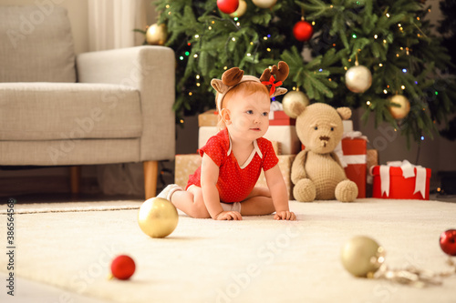 Cute little baby in room de...