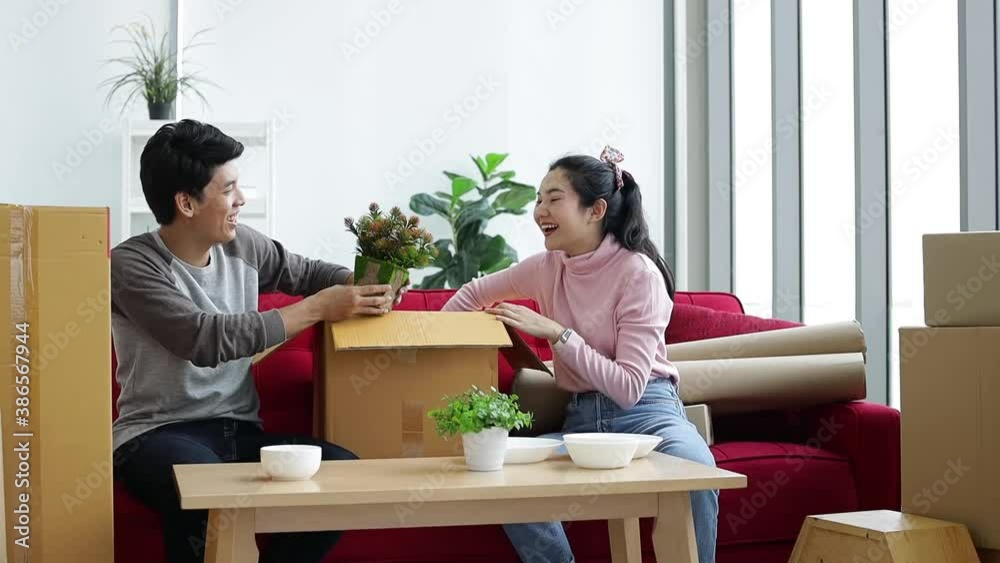Excited happy young couple looking forward to moving into a new home. moving in new house. Excited happy young couple looking forward to moving into a new home. moving in new house.