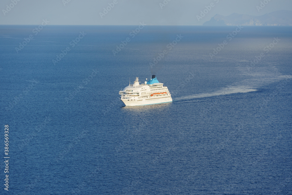 Beautiful sea view. Cruise at the sea near islands. Santorini island, Greece.