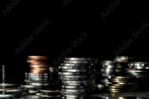 Wallpaper Mural Stack of different coins on dark background. Torontodigital.ca