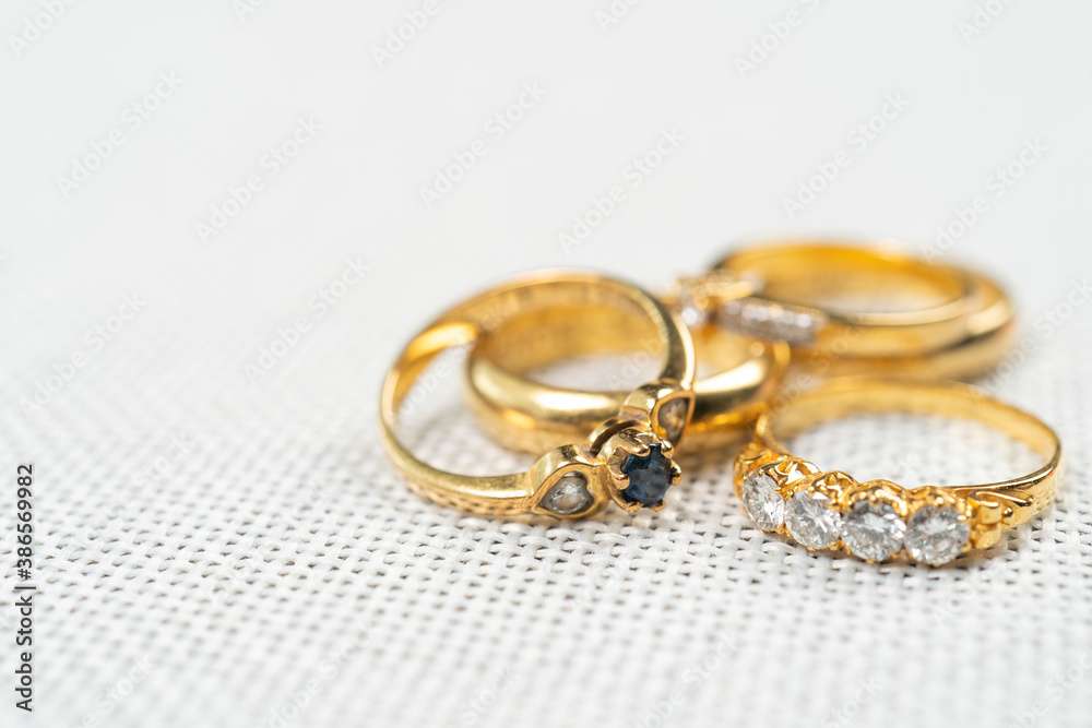 Group of diamond ring on white sack background. Group of diamond ring on white sack background.
