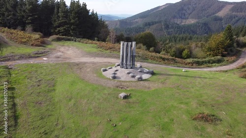 yoshin ogata sculpture in the mountains in the basque country, spain (aerial shot made with drone) photo