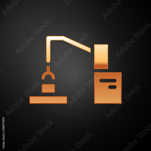 Gold Industrial machine robotic robot arm hand factory icon isolated on black background. Industrial robot manipulator. Vector.