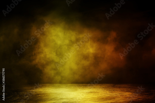 Empty space of Concrete floor grunge texture background with fog or mist and golden lighting effect.