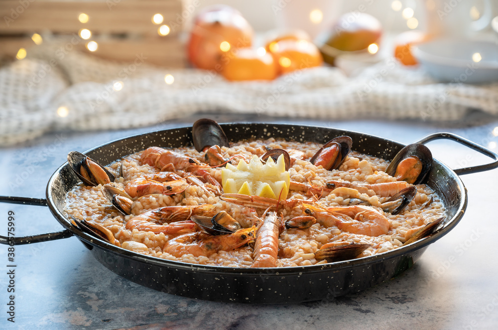 Rice paella with prawns, mussels, clams, squid