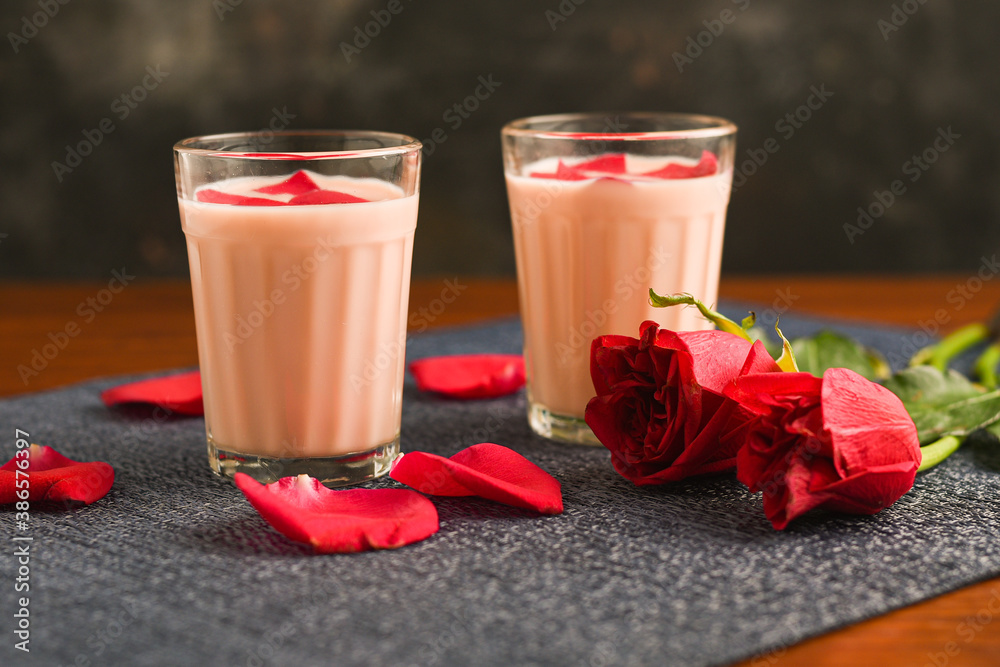 Rose milk , Rose shake , Gulab Shake with rose petals Indian valentines day  drink with heart shaped