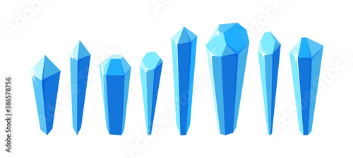 Ice crystals and minerals isolated in white background. Set of separate crystals made of blue mineral. Vector illustration in cartoon style for game design