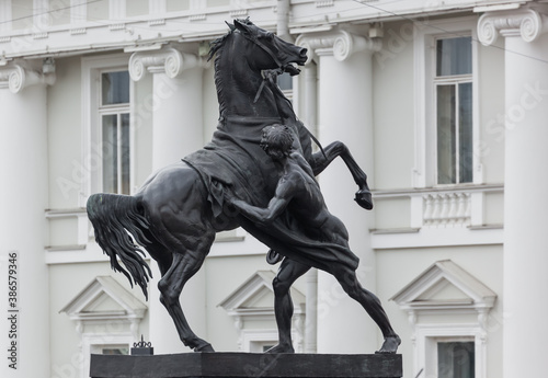 Anichkov Bridge with sculptures of horses - Saint-Petersburg Russia photo