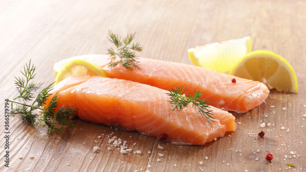 raw salmon fillet and lemon raw salmon fillet and lemon