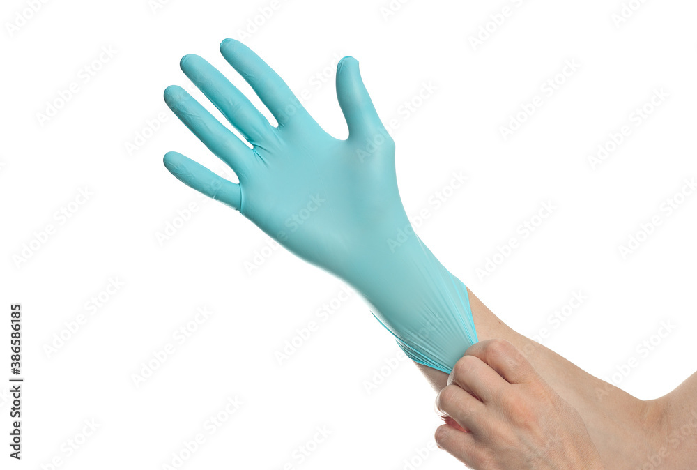 Doctor hands with blue surgical gloves isolated on white background. Medical staff protective gear against coronavirus COVID 19. Health care. Protection concept