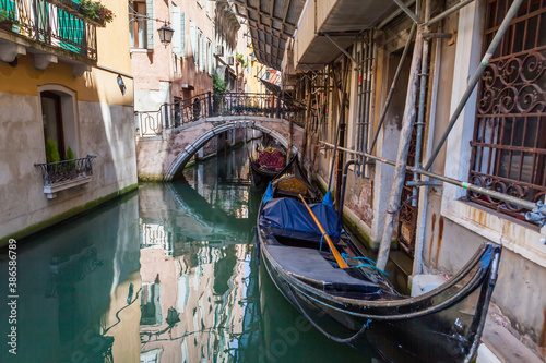 Gandolas at the canal of Venice, Italy © alexxich