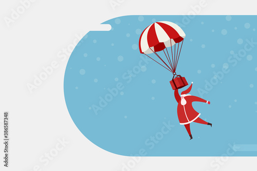 Santa Claus with a gift flying in a hot air balloon 