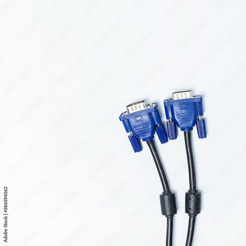 Cable HDMI To VGA on isolated background. Concept of maintenance and repair of personal computer components. Top view. Cable HDMI To VGA on isolated background. Concept of maintenance and repair of personal computer components. Top view.